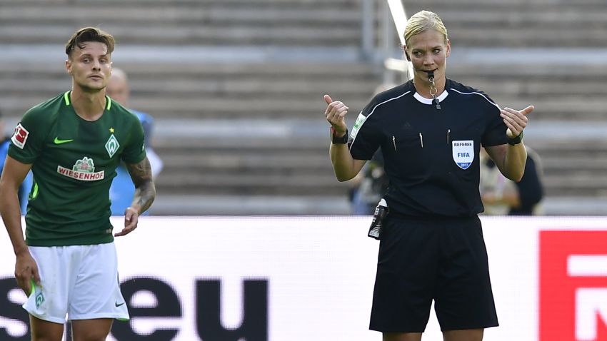 Referee Bibiana Steinhaus attends the German First division Bundesliga football match Hertha Berlin vs Werder Bremen in Berlin, on September 10, 2017. / AFP PHOTO / Tobias SCHWARZ / RESTRICTIONS: DURING MATCH TIME: DFL RULES TO LIMIT THE ONLINE USAGE TO 15 PICTURES PER MATCH AND FORBID IMAGE SEQUENCES TO SIMULATE VIDEO. == RESTRICTED TO EDITORIAL USE == FOR FURTHER QUERIES PLEASE CONTACT DFL DIRECTLY AT + 49 69 650050
        (Photo credit should read TOBIAS SCHWARZ/AFP/Getty Images)
