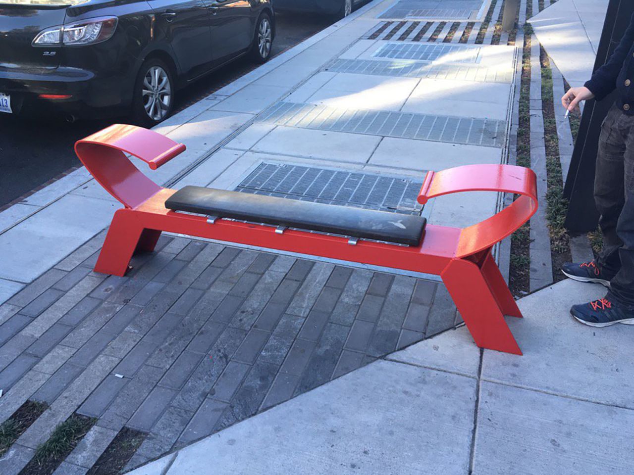 The armrests on this bench also prevent people from sleeping on it.