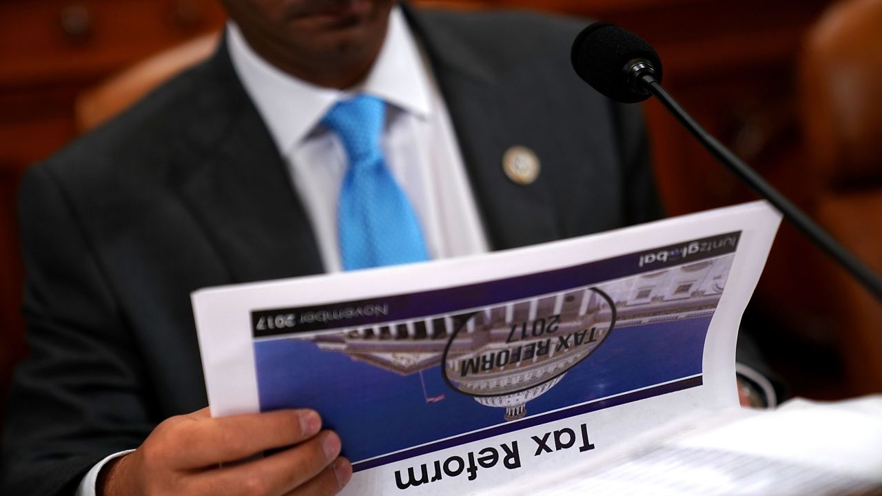 WASHINGTON, DC - NOVEMBER 06:  House Ways and Means Committee member Rep. Carlos Curbelo (R-FL) prepares for a markup hearing of the proposed GOP tax reform legislation in the Longworth House Office Building on Capitol Hill November 6, 2017 in Washington, DC. (Chip Somodevilla/Getty Images)