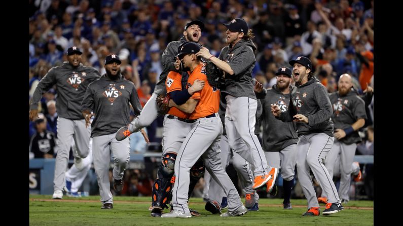 The Houston Astros celebrate after defeating the Los Angeles Dodgers 5-1 in <a href="index.php?page=&url=http%3A%2F%2Fwww.cnn.com%2F2017%2F11%2F01%2Fsport%2Fgallery%2Fworld-series-game-7-astros-dodgers%2Findex.html" target="_blank">Game 7 of the World Series</a> on Wednesday, November 1. It is the first time the Astros have won the World Series.