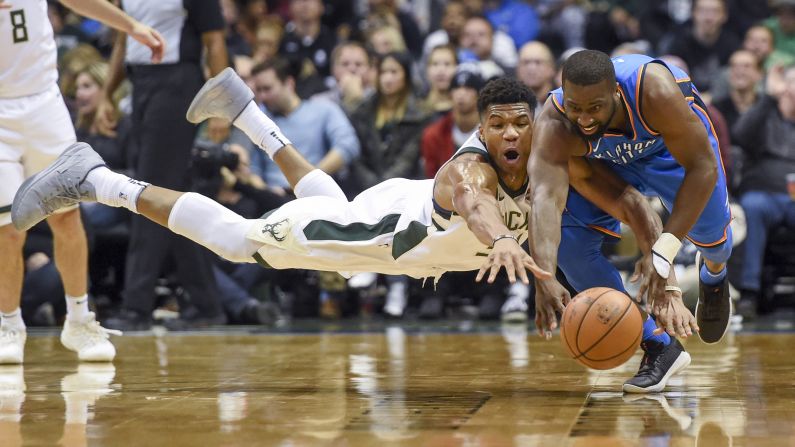 Oklahoma City guard Raymond Felton, right, competes for a loose ball with Milwaukee forward Giannis Antetokounmpo during an NBA game on Tuesday, October 31.