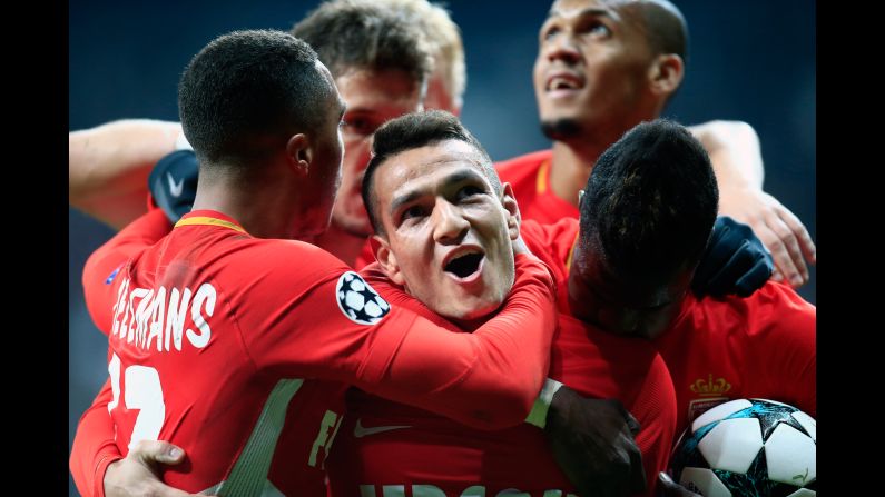 Marcos Lopes, center, is swarmed by his Monaco teammates after scoring the opening goal of their Champions League match against Besiktas on Wednesday, November 1. The match ended 1-1 in Istanbul.