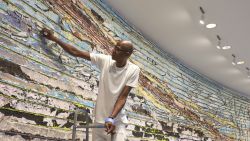 Mark Bradford at the Hirshhorn Museum and Sculpture Garden with details of "Pickett's Charge" (2017)