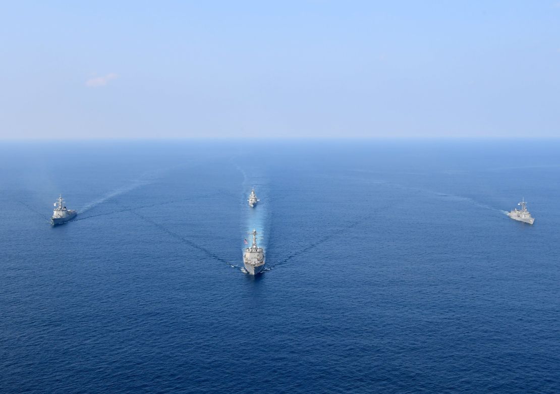 A photo released by the South Korean Navy shows the US, South Korea and Australia participating in joint naval drills. 