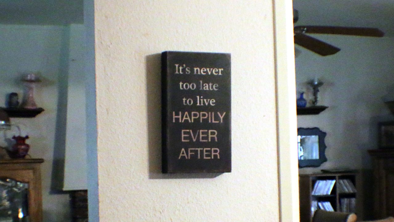 A sign that hangs in Deborah Giannecchini's house. Giannecchini has ovarian cancer.