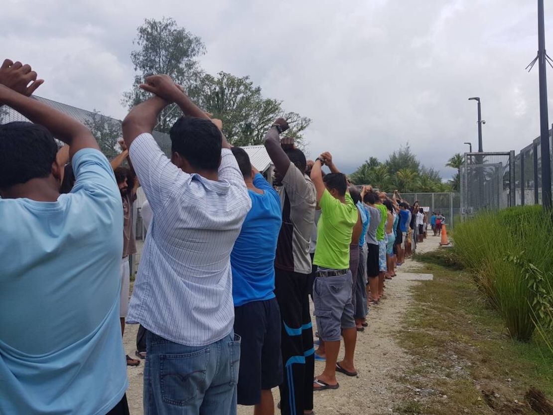 Refugees protest at the Manus Island detention center in November, which they currently refuse to leave.