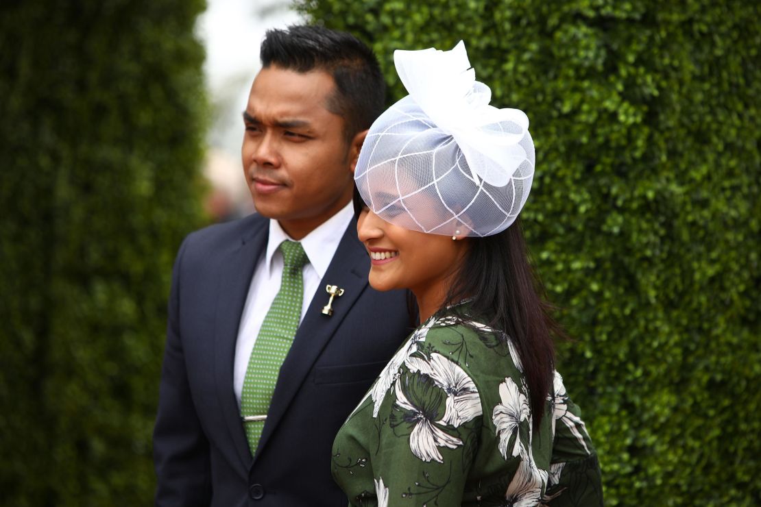 Racegoers enjoy the atmosphere on Melbourne Cup Day at Flemington Racecourse on November 7.
