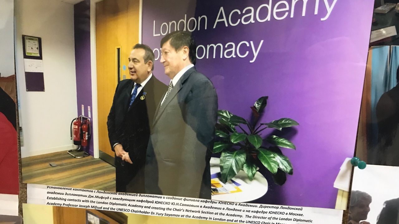 Picture on the wall at Moscow State University (MSU) of Joseph Mifsud (left) with Yury Sayamov, UNESCO Chairholder in the Faculty of Global Processes at MSU. The picture was taken while the two men were at the London Diplomatic Academy.