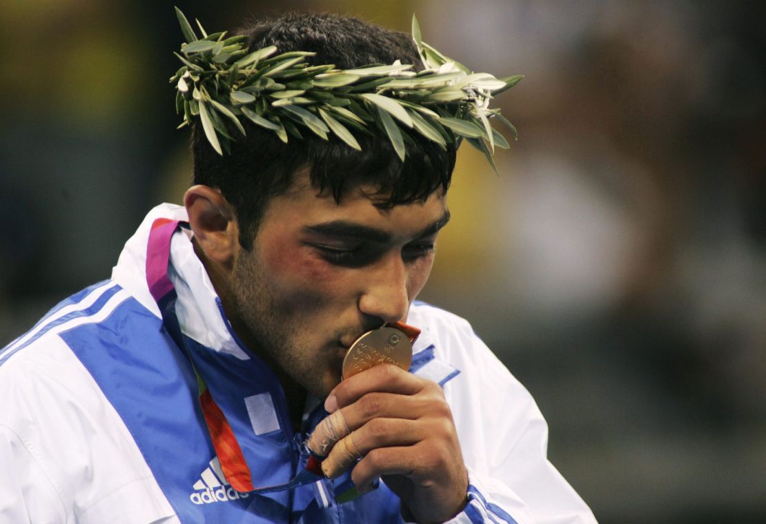 Iliadis celebrates becoming Olympic champion in the half-middleweight (-81kg) division at Athens 2004.