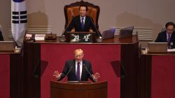 US President Donald Trump (C) addresses the National Assembly in Seoul on November 8, 2017.
Trump's marathon Asia tour moves to South Korea, another key ally in the struggle with nuclear-armed North Korea, but one with deep reservations about the US president's strategy for dealing with the crisis. / AFP PHOTO / JIM WATSON        (Photo credit should read JIM WATSON/AFP/Getty Images)