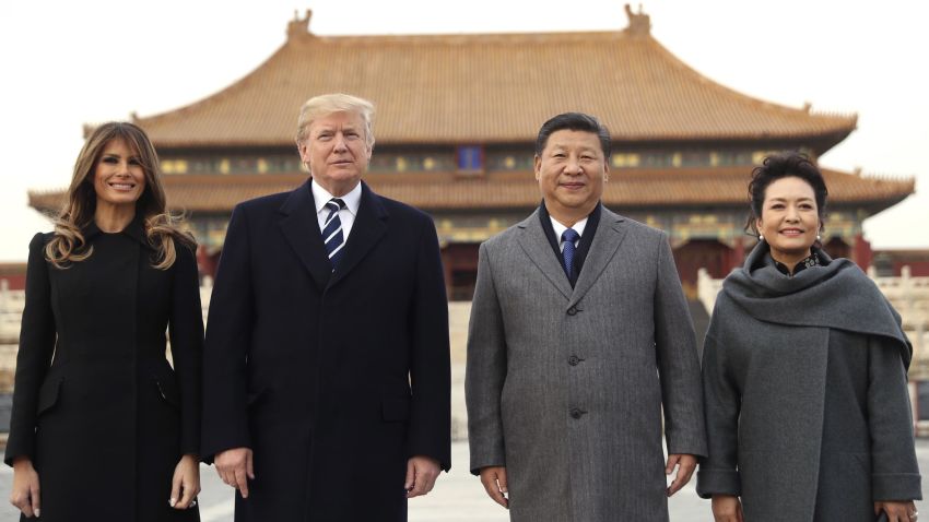 President Donald Trump, center left, first lady Melania Trump, left,  Chinese President Xi Jinping, center right, and his wife Peng Liyuan, right, stand together as they tour the Forbidden City, Wednesday, Nov. 8, 2017, in Beijing, China. Trump is on a five country trip through Asia traveling to Japan, South Korea, China, Vietnam and the Philippines. (AP Photo/Andrew Harnik)