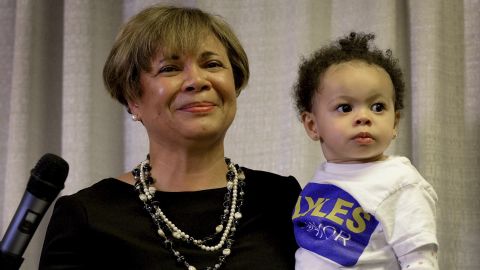 Vi Lyles, Charlotte's Democratic mayor pro tem, listens to the applause of supporters with her granddaughter following her victory on Tuesday.