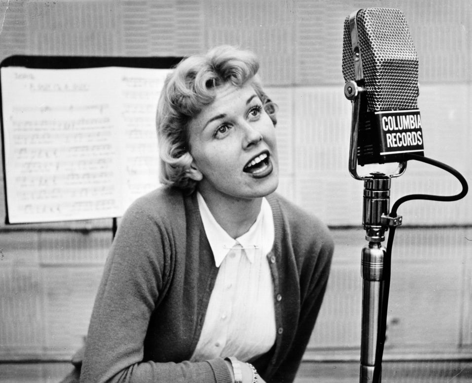 Day became a performer on local radio and then joined a swing band. The bandleader feared that her last name was too long for a marquee, so he dubbed her Doris Day after a song of hers, "Day After Day." In 1947, she signed a contract with Columbia Records.