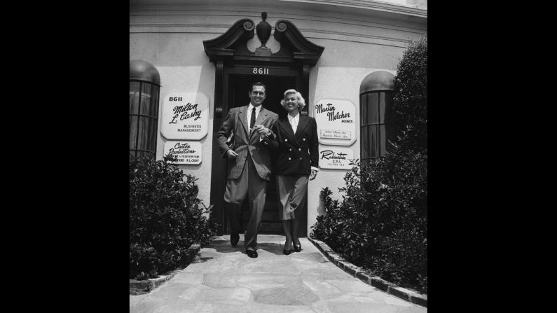 Day with her third husband and manager, Martin Melcher, outside his talent agency in Hollywood. Melcher died unexpectedly in 1968, leaving Day in financial straits.