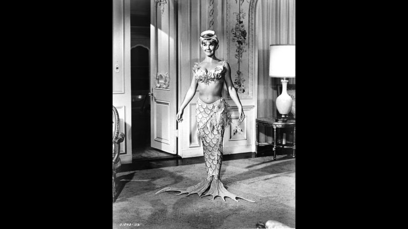 Day is dressed in a mermaid suit from the film "The Glass Bottom Boat" in 1966.