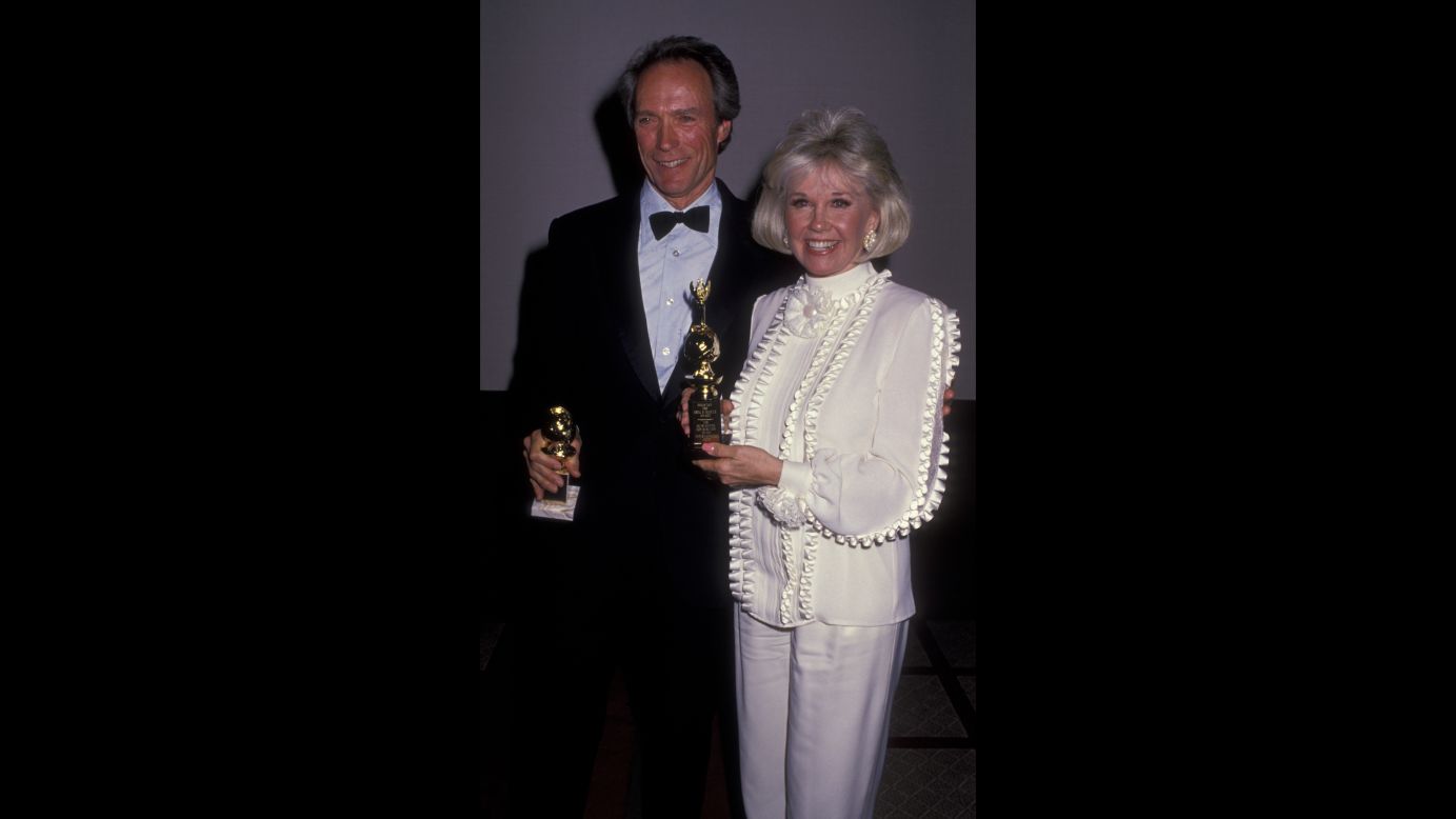 Day and Clint Eastwood attend the Golden Globes in 1989.