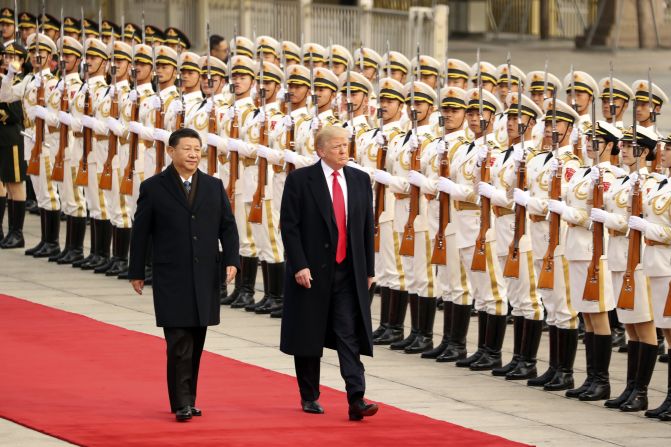 US President Donald Trump and XI take part in a welcome ceremony at the Great Hall of the People on Thursday, November 9, 2017, in Beijing during <a href="index.php?page=&url=http%3A%2F%2Fwww.cnn.com%2Finteractive%2F2017%2F11%2Fpolitics%2Ftrump-asia-tour-cnnphotos%2Findex.html" target="_blank">Trump's visit to Asia. </a>