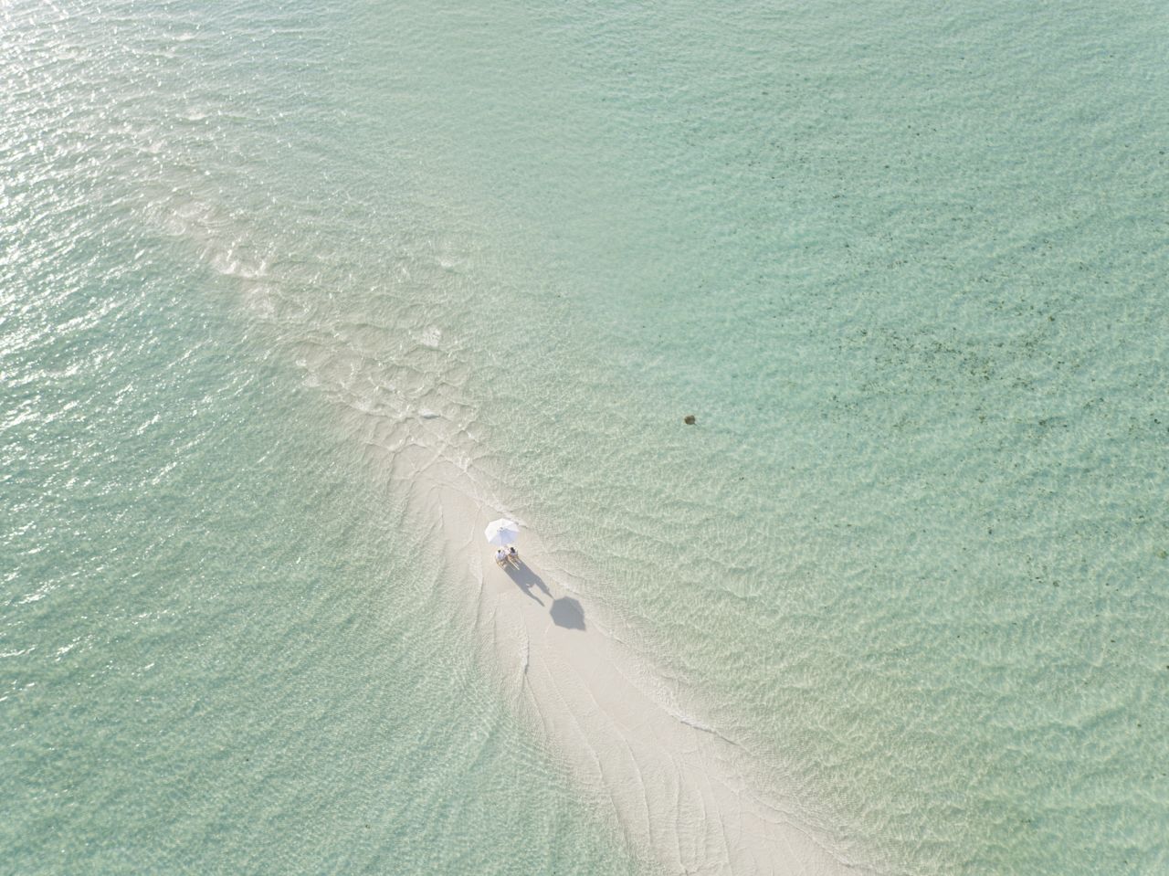 <strong>Private stretches of sand:</strong> The island of Medhufaru is 150 acres in size and sits inside a  5.6-kilometer lagoon, meaning guests will always be able to find their own private stretch of white sand. 