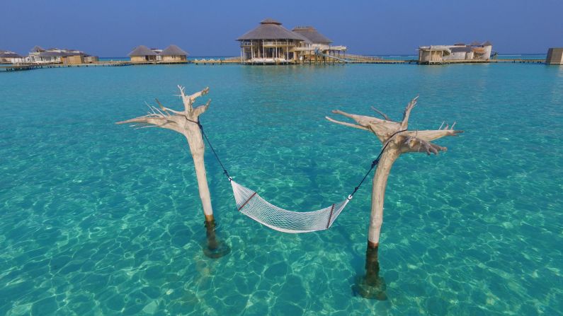 <strong>Water hammock: </strong>It takes a bit of time to swim out to the resort's water hammock -- and can be a challenge to climb into during high tide -- but the effort is worth it. 