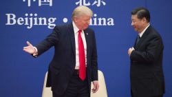 US President Donald Trump (L) gestures next to China's President Xi Jinping during a business leaders event at the Great Hall of the People in Beijing on November 9, 2017.
Donald Trump urged Chinese leader Xi Jinping to work "hard" and act fast to help resolve the North Korean nuclear crisis, during their meeting in Beijing on November 9, warning that "time is quickly running out". / AFP PHOTO / Nicolas ASFOURI        (Photo credit should read NICOLAS ASFOURI/AFP/Getty Images)