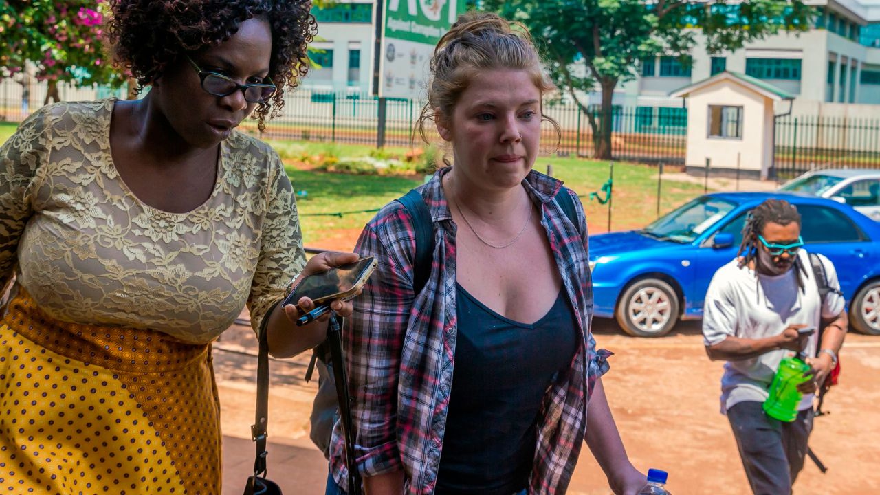 Martha O'Donovan, center, arrives at a Harare court on November 4.