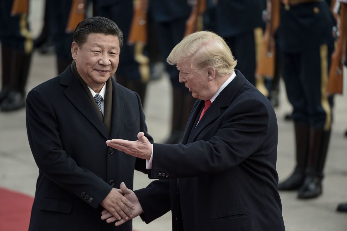 China's President Xi Jinping and US President Donald Trump attend a welcome ceremony at the Great Hall of the People in Beijing in November.