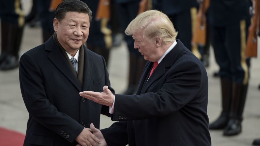 China's President Xi Jinping (L) and US President Donald Trump attend a welcome ceremony at the Great Hall of the People in Beijing on November 9, 2017.  / AFP PHOTO / FRED DUFOUR        (Photo credit should read FRED DUFOUR/AFP/Getty Images)