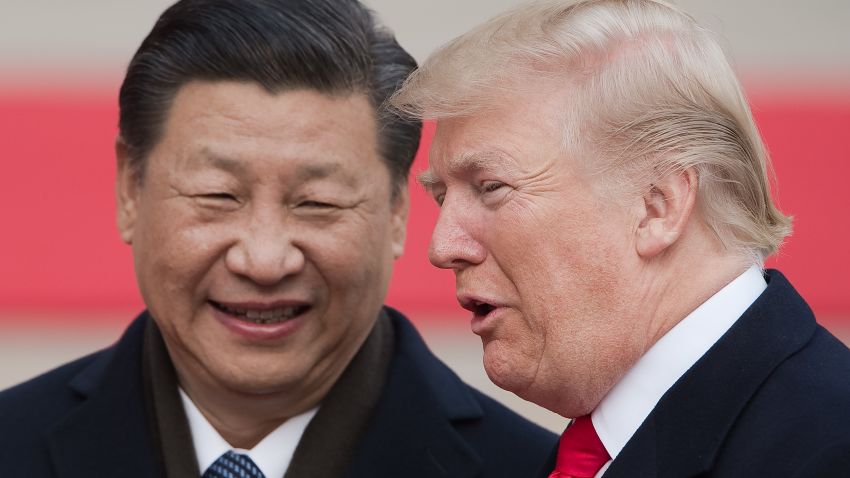 China's President Xi Jinping (L) and US President Donald Trump attend a welcome ceremony at the Great Hall of the People in Beijing on November 9, 2017. / AFP PHOTO / NICOLAS ASFOURI        (Photo credit should read NICOLAS ASFOURI/AFP/Getty Images)