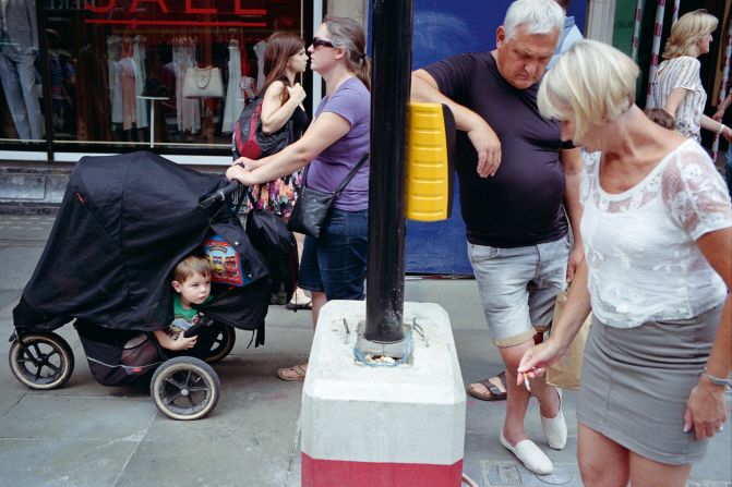 A scene in the heart of London's West End, taken by British street photographer Matt Stuart.