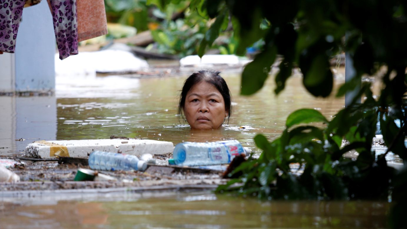 A woman wades through a flooded street in Hoi An, Vietnam, on Monday, November 6. <a href="http://www.cnn.com/2017/11/06/asia/vietnam-floods-damrey/index.html" target="_blank">More than 80 people were killed in flooding</a> caused by Tropical Cyclone Damrey, authorities said.