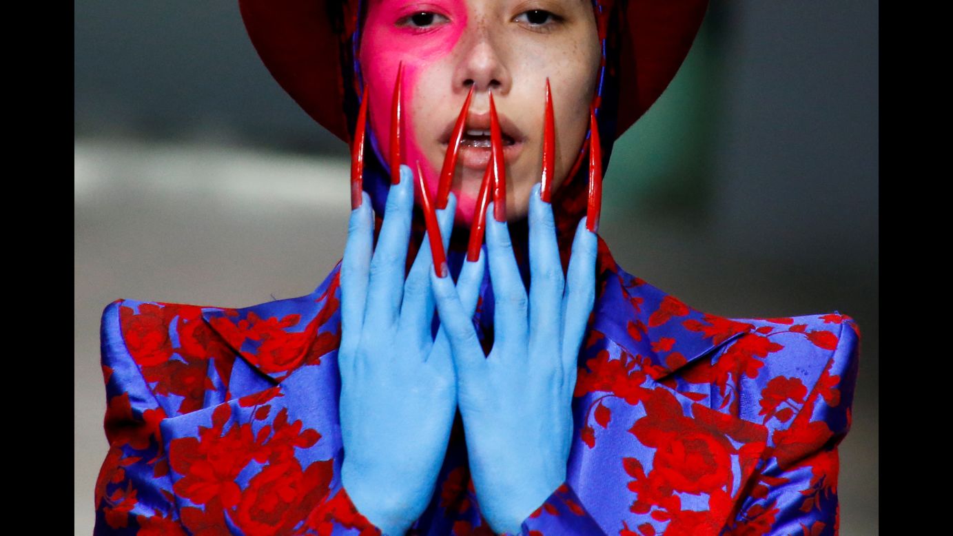 A model presents a creation by Hu Sheguang during a fashion show in Beijing on Tuesday, November 7.