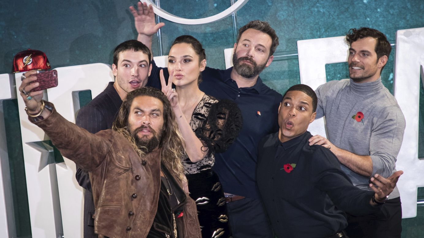 Actor Jason Momoa takes a selfie with his "Justice League" co-stars in London on Saturday, November 3. With Momoa, from left, are Ezra Miller, Gal Gadot, Ben Affleck, Ray Fisher and Henry Cavill.