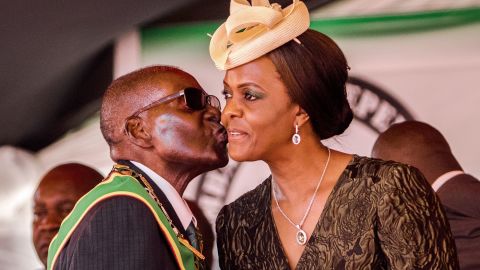 President Robert Mugabe kisses his wife and first lady Grace Mugabe during during the country's 37th Independence Day celebrations at the National Sports Stadium in Harare April 18, 2017.