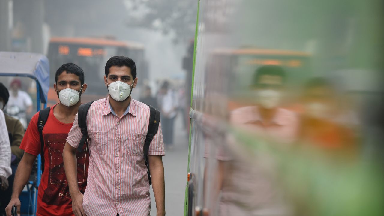 Many Delhi commuters have taken to wearing protective masks.

