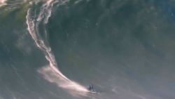 Surfer breaks back 2