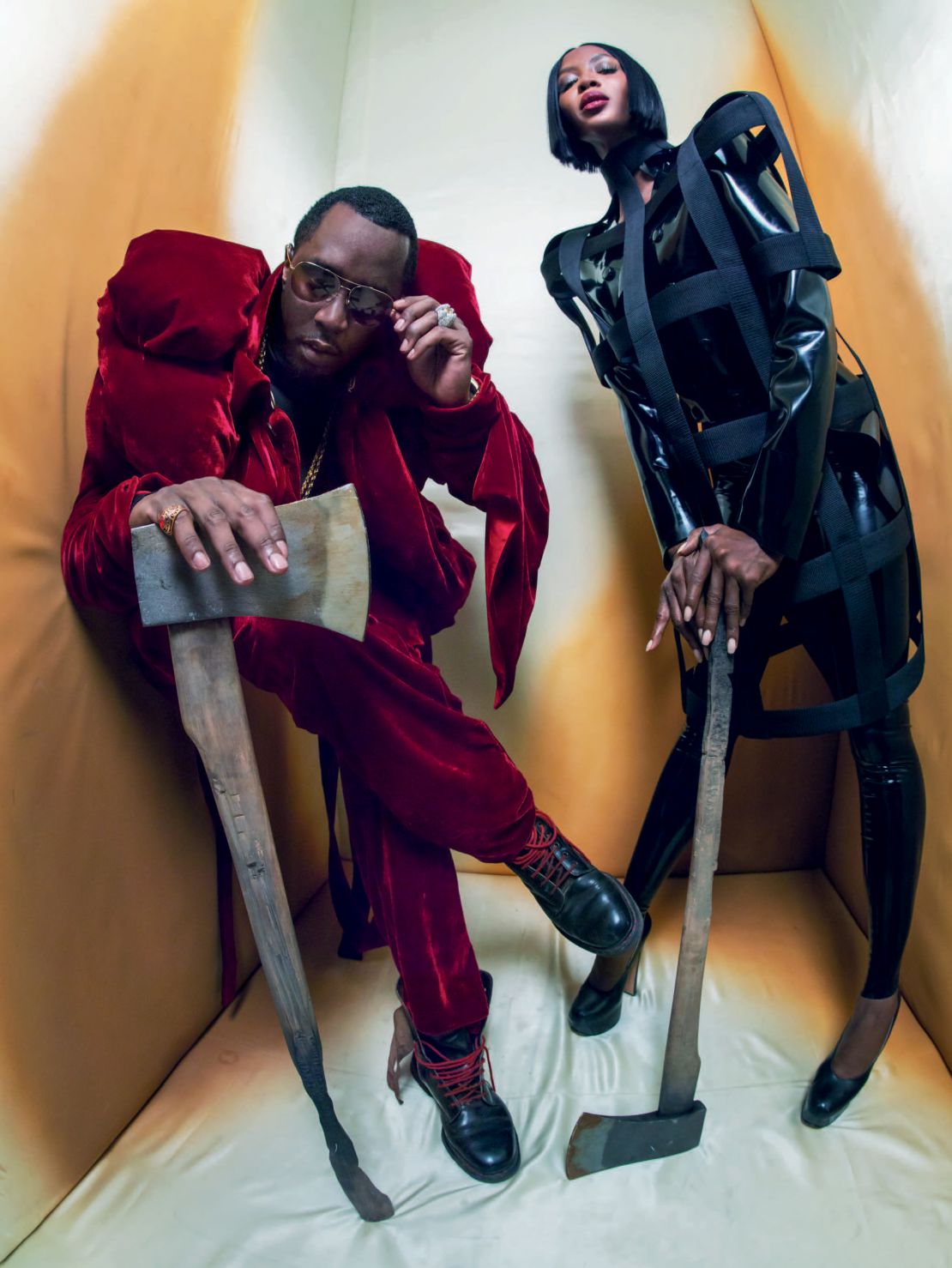 Naomi Campbell and Sean "Diddy" Combs and The Beheaders in the 2018 Pirelli calendar.