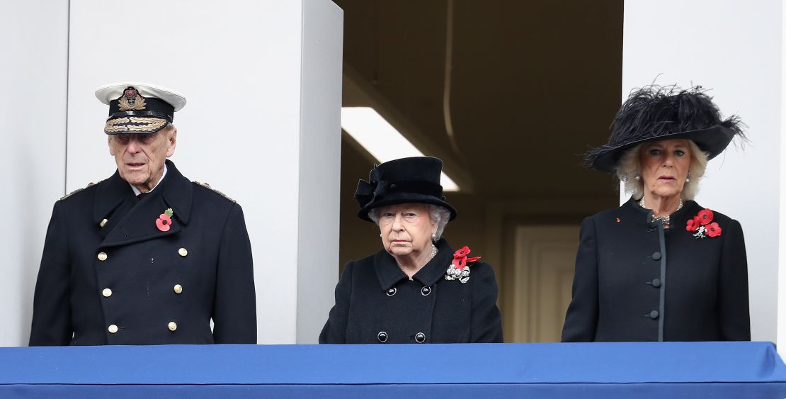 Prince Philip, Queen Elizabeth and Camilla, Duchess of Cornwall, observe the annual Remembrance Sunday memorial.