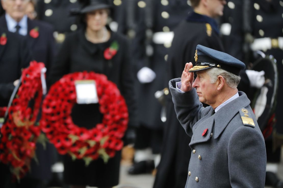 Prince Charles salutes during the Remembrance Sunday ceremony at the Cenotaph.