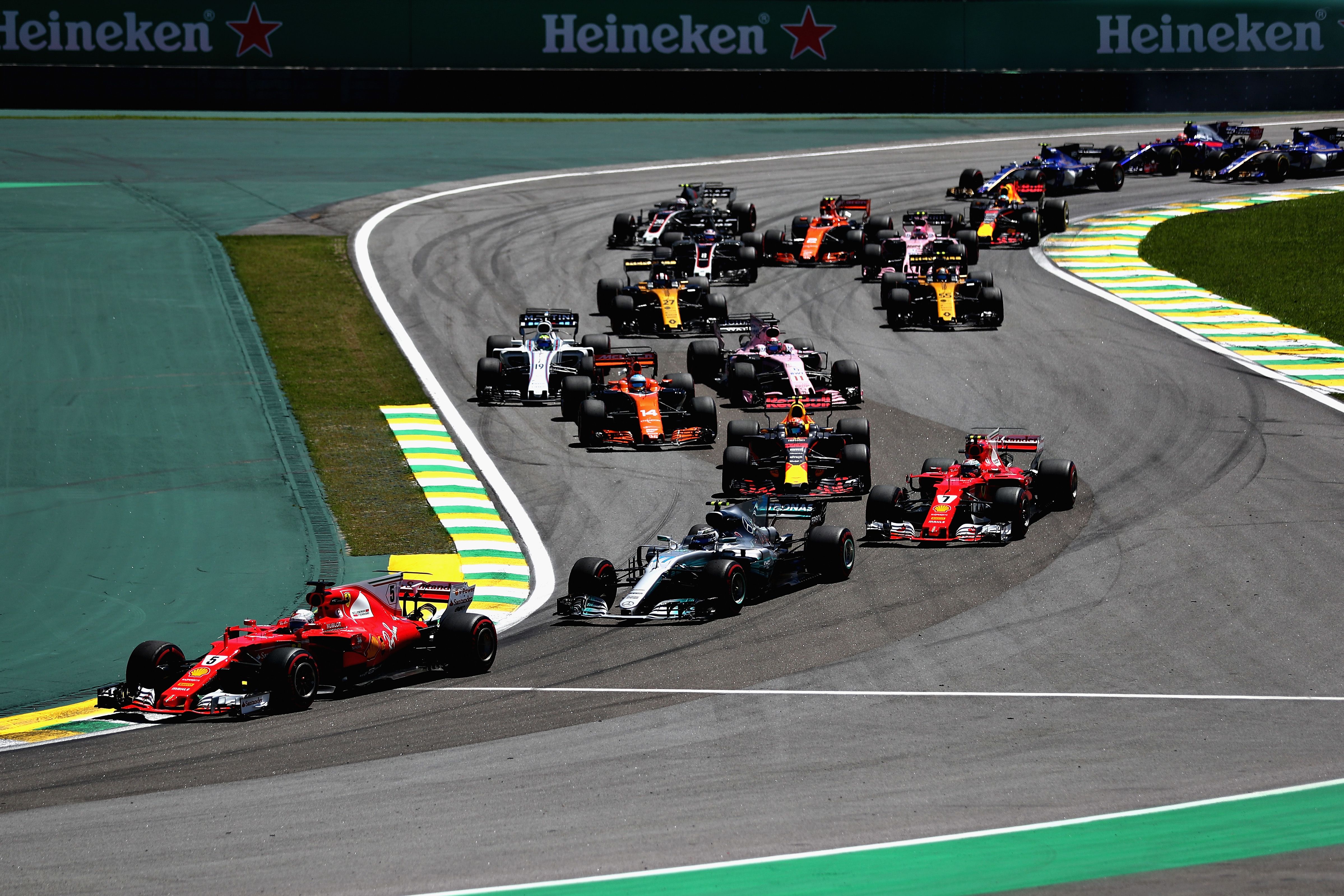 Vettel took the lead at the first corner, heading into the Senna Esses. 