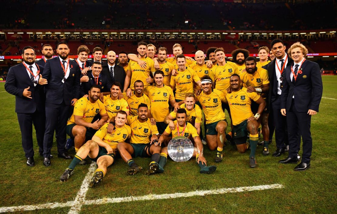 Australia pose for a photo after beating Wales in Cardiff 