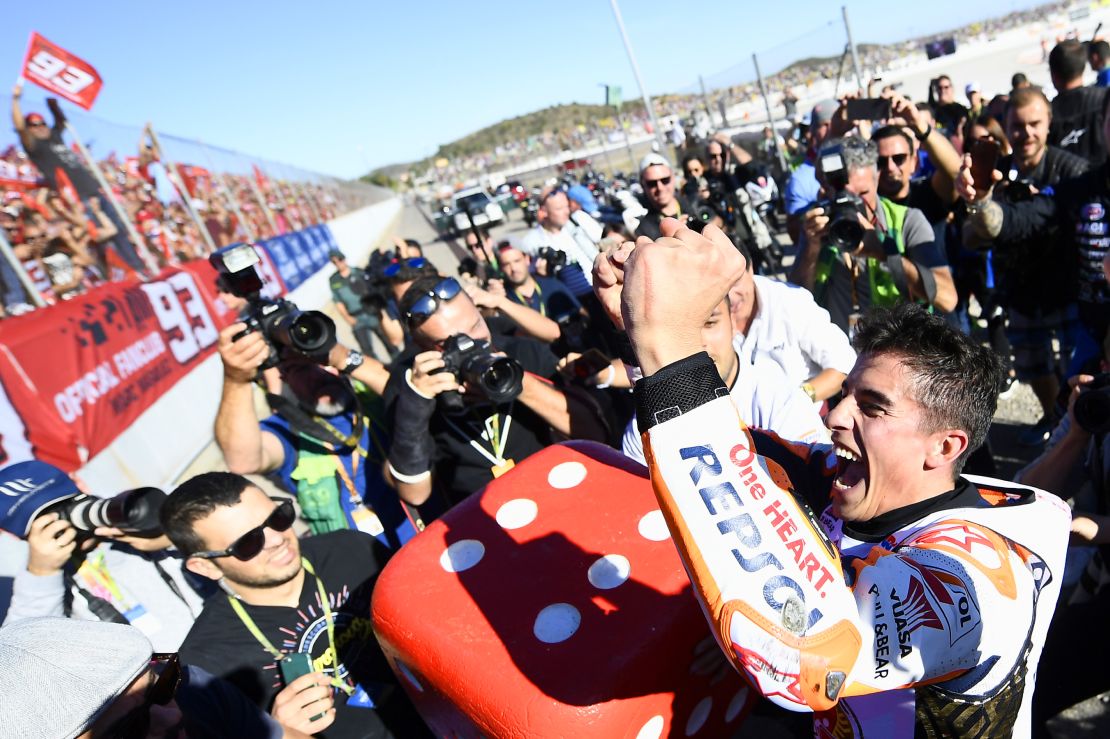 Marquez celebrates his sixth overall world title in Valencia.