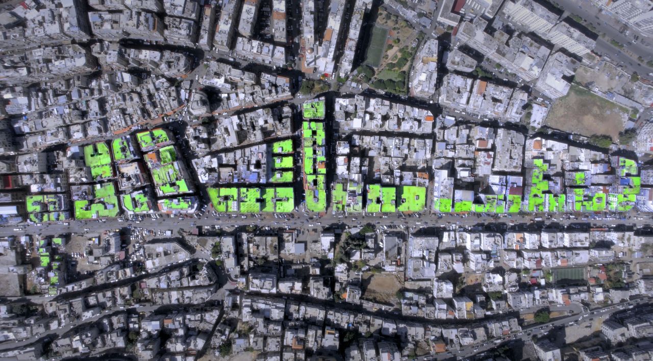 Salam -- the Arabic word for peace -- is spelled out across the roofs of buildings in the Bab-al-Tibbaneh and Jabal Mohsen neighborhoods of Tripoli, Lebanon.