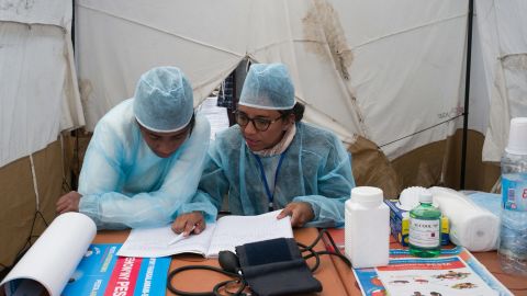 Doctors and nurses from The Ministry of Health and officers of the Malagasy Red Cross staff a health care checkpoint in Antananarivo.