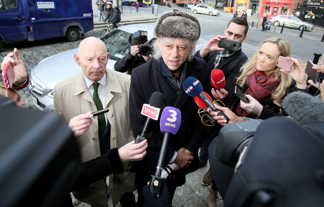 Geldof arrives at Dublin City Hall to return his award Monday. 