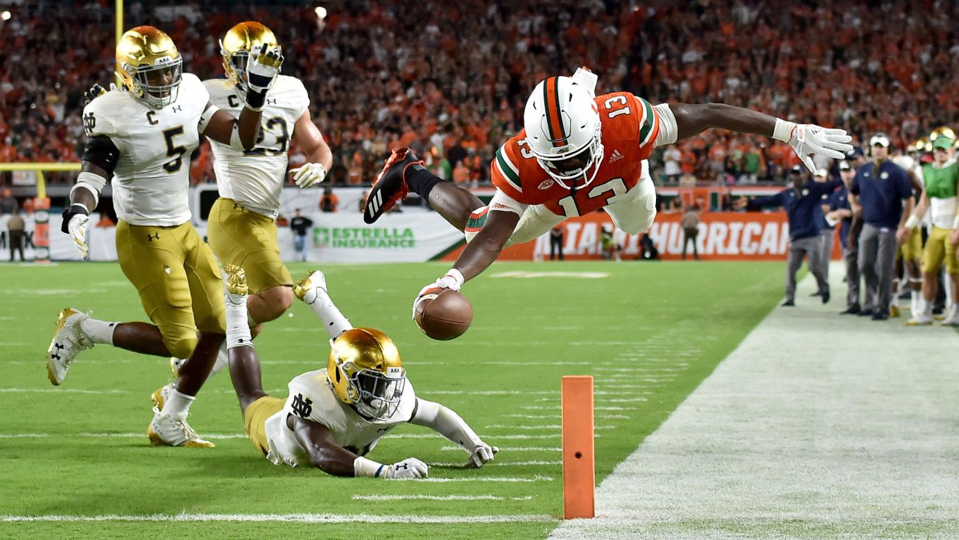 Miami wide receiver DeeJay Dallas dives over the goal line to score a second-half touchdown against Notre Dame on Saturday, November 11. Miami trounced its rival 41-8 to stay undefeated this season (9-0). 