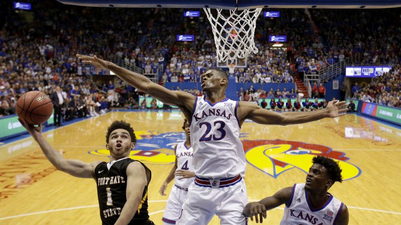 Kansas' Billy Preston blocks a shot by Fort Hays State's Aaron Nicholson during a college basketball game in Lawrence, Kansas, on Tuesday, November 7. Kansas won the exhibition 86-57 and entered the regular season as a top-5 team.