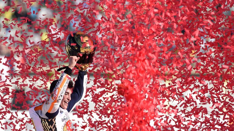 Marc Marquez celebrates <a href="index.php?page=&url=http%3A%2F%2Fwww.cnn.com%2F2017%2F11%2F13%2Fmotorsport%2Fmarquez-youngest-motogp-4th-world-champion-valencia%2Findex.html" target="_blank">the MotoGP title</a> after finishing third in Cheste, Spain, on Sunday, November 12. The 24-year-old Spaniard is the youngest rider in MotoGP history to win four world titles.