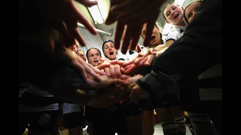 The Barbarians women, an invitational rugby team made up of some of the world's best players, huddle in the dressing room before their inaugural match in Limerick, Ireland, on Friday, November 10. The Barbarians men's team has been around since the 19th century.