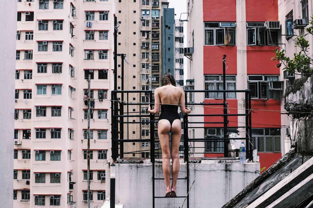 <strong>Natasza Minasiewicz: </strong>An architect and interior designer with an imaginative streak, Minasiewicz sees the world in a unique way. In "Sai Ying Pun," the photographer explores the relationship between women and the city of Hong Kong.