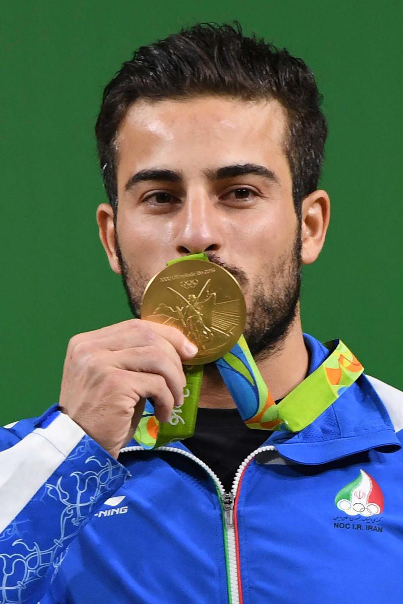 Olympic weightlifter auctions his gold medal for Iran quake